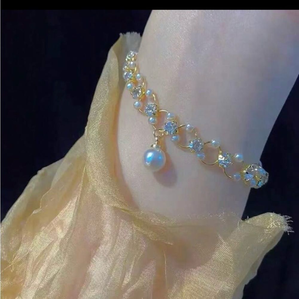 Not Rated Gold and Pearl Charm Bracelet